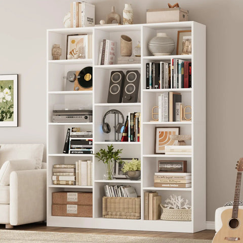 Triple Wide Bookshelf With Six Tier Storage And Seventeen Open Shelves In Pure White showcasing books, decor, and audio items for stylish organization.