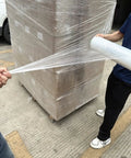 Two Pack Clear Stretch Wrap Film 18 Inch By 1000 Feet 80 Gauge Industrial Strength in use on pallet