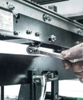 Close-up of hand using Zyklop Imperial Metal Ratchet Set, 29-Piece, 3/8 Inch Drive for machinery repair