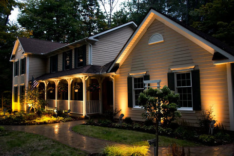 Brighten Your Outdoor Space With A 10 Pack Low Voltage LED Landscape Lights 7W 900LM Waterproof Garden highlighting house facade.