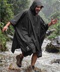 Man wearing a Hooded Waterproof Rain Poncho For Men And Women Stay Dry In Any Downpour All Weather Jacket With PU 5000MM Coating