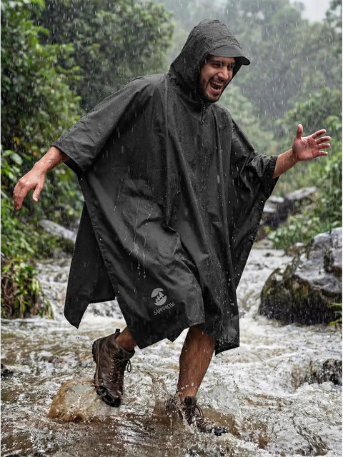 Man wearing a Hooded Waterproof Rain Poncho For Men And Women Stay Dry In Any Downpour All Weather Jacket With PU 5000MM Coating