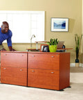Person using 8-Piece Carpet Furniture Sliders Set For Easy Moving Of Beds, Sofas, Dressers And Heavy Furniture, Beige on carpet