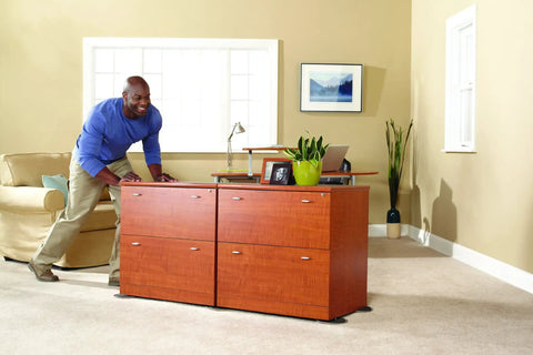 Person using 8-Piece Carpet Furniture Sliders Set For Easy Moving Of Beds, Sofas, Dressers And Heavy Furniture, Beige on carpet
