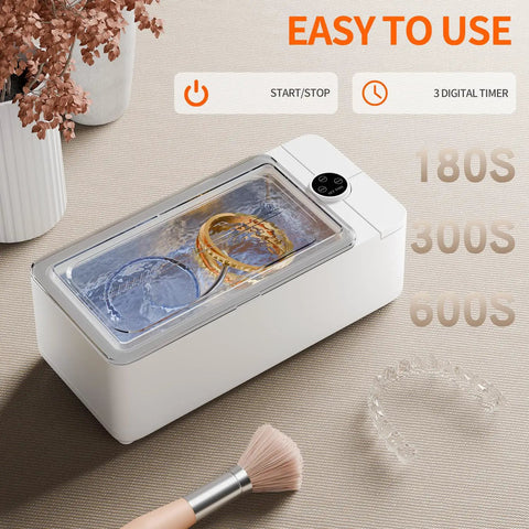 Quick Grab 50 Khz Ultrasonic Cleaner With Three Timer Settings For Bling Glasses Watches Dentures And Razors To Keep Your Daily Carry Fresh Without Any Drama Or Excess Mess Around Your Sink Area, featuring rings and retainer in a 350ml tank.