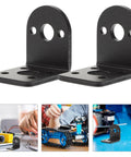 Front view: two black metal L-shaped motor mounting brackets with multiple holes