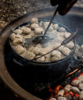 Campfire cooking with Cast Iron Dutch Oven Lid Lifter And Folding Lid Stand For Camping Heavy Duty Steel Trivet Lifter and Skillet Holder.