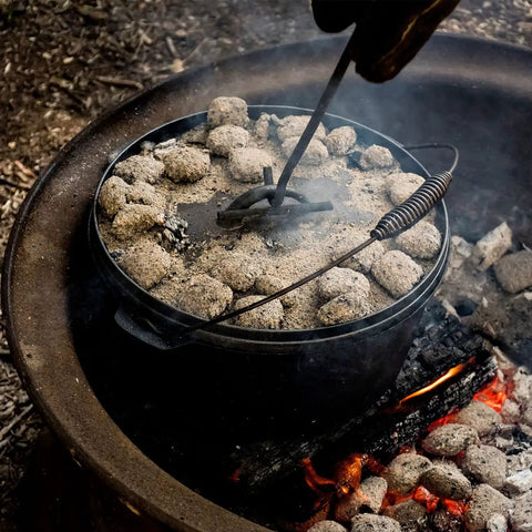 Campfire cooking with Cast Iron Dutch Oven Lid Lifter And Folding Lid Stand For Camping Heavy Duty Steel Trivet Lifter and Skillet Holder.