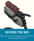 Mule 9 Bikepacking Rolltop Waterproof Saddle Bag For Tents And Gear With IPX5 Rating mounted on bike, carrying a rolled tent.