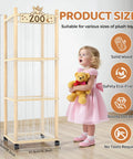 56 Inch Tall Wooden Stuffed Animal Storage Tower With Wheels next to a child holding a teddy bear, showing product size.