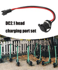 Beefy 5.5x2.1mm Power Socket for Scooters with cable alongside parked electric scooters, showcasing charging compatibility.