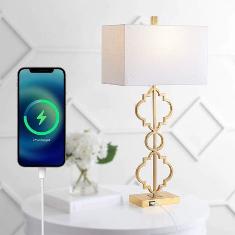 32-Inch Gold Iron Ogee Trellis Table Lamp With USB Port, Modern Glam Geometric Base, White Linen Rectangle Shade, LED Bulb Included, ETL Listed Lit Living Room And Bedroom Lighting next to a charging phone
