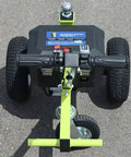 Tow Tuff Electric Trailer Dolly With 3500 Lb Capacity top view showing control handles and wheels on a flat surface.