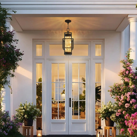 Built Like A Tank Modern Pendant Ceiling Light For Indoors Or Outdoors, Totally Waterproof Black Aluminum Porch Lantern Featuring Textured Water Ripple Glass, Includes Matching Bulb, hung over a white entry door.