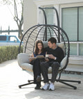Egg Chair With Stand Hammock Swing Chair Foldable Hanging Loveseat For Indoor Or Outdoor Use with two people seated