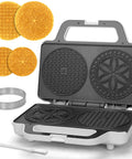 SugarWhisk Electric Pizzelle Maker Non-Stick Stroopwafel Iron And 5 Inch Cookie Machine with mold and baked cookies.