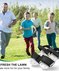 Family running on lawn with Super Easy Manual Lawn Aerator Shoes with Aluminum Soleplate and Stainless Steel Spikes in foreground