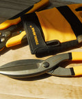 Tin Snips 10 Inch Straight Pattern Tinners Snips With Comfort Grip on wooden table, yellow and black handles visible