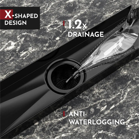 Close-up of 24 Inch Linear Shower Drain With Accessories showcasing X-shaped design and central outlet in dark finish.