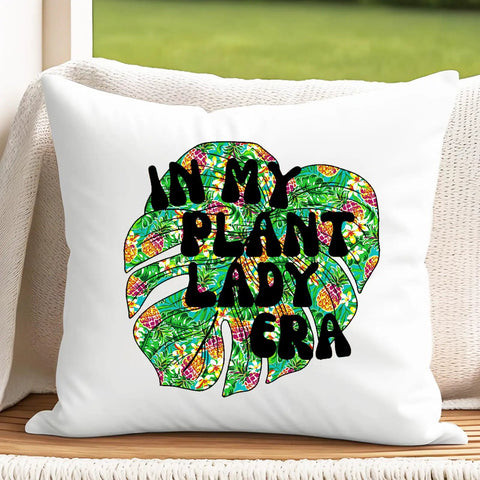 Decorative pillow with text 'In My Plant Lady Era' using Dope Tropical Leaves Heat Transfer Vinyl Set With 10 Sheets 10x12 Inches Multicolor Pineapple Hawaiian Floral Pattern HTV For DIY T Shirts Hats Bags Easy Cut Weed And Transfer.