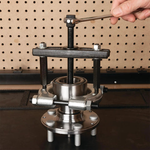 5 Ton Bearing Separator Kit With Bar Puller And Splitters 2 Inch And 3 Inch Hex Push Puller Legs in use on gear hub