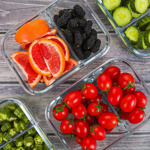 Two Compartment Glass Meal Prep Containers Pack Of 10 With Lids, 30 Oz Each, filled with fresh fruits and vegetables.