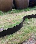 No Dig Interlocking Garden Edging Kit 40 Piece 20 Ft Long 5 Point 3 In Tall Plastic Landscape Border in use on lawn
