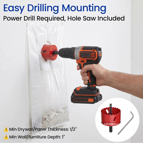Installation of in wall cable management kit for TVs using a power drill and included hole saw for 2-3/8 inch grommet placement.