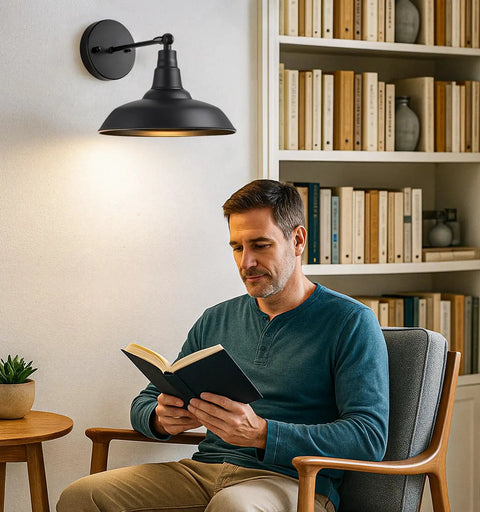 Man reading under Black Vintage Battery Operated Wall Sconce Set Of 2 With Remote Control Cordless Indoor Wall Lamps in living room