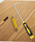 Multi Function Stainless Steel Roller Shutter Hook And Manhole Cover Lifter With Plush Rubber Grip on wooden surface.