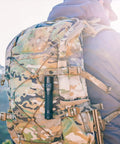 Ultra Bright 1800 Lumen LED Tactical Flashlight Beast Bright Beam Rechargeable Waterproof Dual Switch With 22 Hours Battery Life on camo backpack