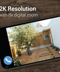 Outdoor 2K Security Camera With Auto Spotlight showing 2K resolution with 8x digital zoom on garden view
