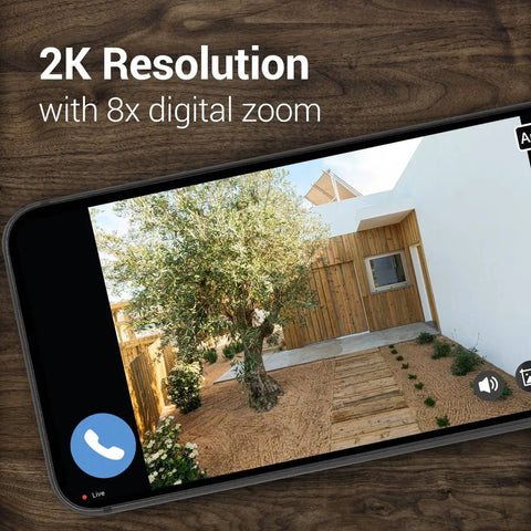 Outdoor 2K Security Camera With Auto Spotlight showing 2K resolution with 8x digital zoom on garden view