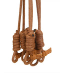 Close-up of waxed cord loops on Canvas Bird Game Carrier For Waterfowl And Small Animals with cowhide leather trim and brass snap hook.