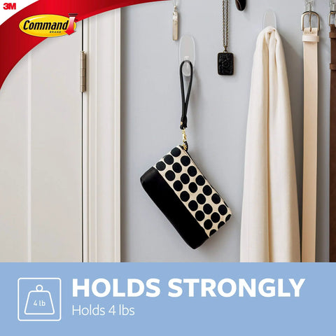 Six Pack Large Clear Hooks Damage Free Hanging Holds Up To 4 Lbs Each Indoor Plastic Hooks with Strips holding purse on wall