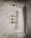 Statement VES Single-Function Showerhead 1.5 GPM Vibrant Brushed Nickel in marble shower with wall-mounted controls