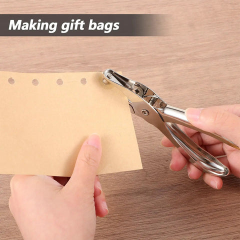 Person using Dope 20 Pack One Quarter Inch Single Hole Punch Set for making gift bags, showcasing metal hand paper puncher and punched paper.