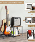 Vintage Brown Guitar Amp Stand With Double Rack For Acoustic Electric Bass And Ukulele Storage Holder Heavy Duty Floor Stand displays guitar, amp, and records.