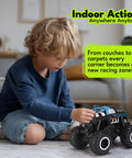 Child playing with 1to16 Scale Totally Waterproof Monster Truck RC Car Amphibious Remote Control Vehicle 4WD indoors on carpet.