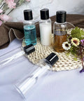 5 Pack 3.4 Oz Travel Bottles With Labels Leakproof Plastic Containers TSA Approved Travel Size Empty Bottles Set on a woven mat with flowers