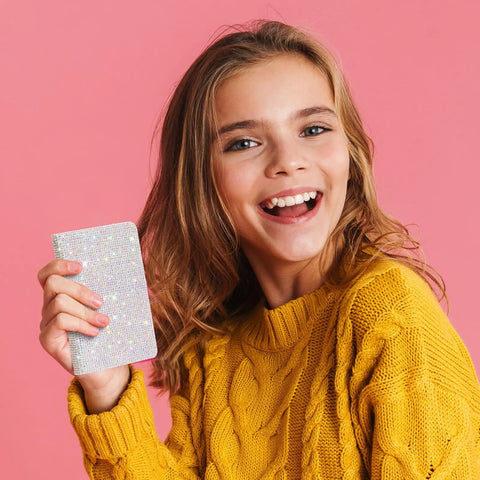 Girl holding Bling Rhinestone Notebook Set Glitter Pocket Journal With Crystal Pen Mini Diamond Diary Hardcover For Women A6 Size Silver Office Desk Accessories Birthday Gift 