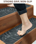 Foot stepping on Peel And Stick Non Slip Stair Treads 8x30 Inches 15 Pack For Wooden Steps With Measuring Tool Easy Install Dark Grey Anti Slip Stair Carpet Runner Self Adhesive Grip
