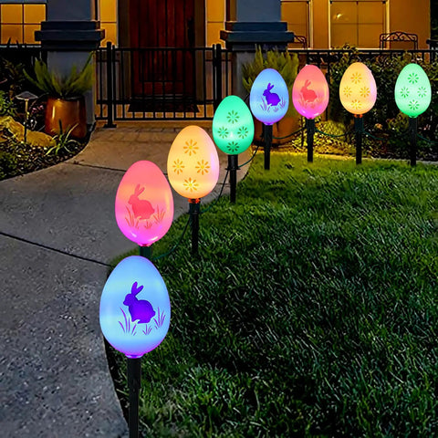 20 LED Solar Easter Egg Lights Outdoor Stake With 25 Ft Cord, 8 Modes Waterproof lighting up a garden path at night