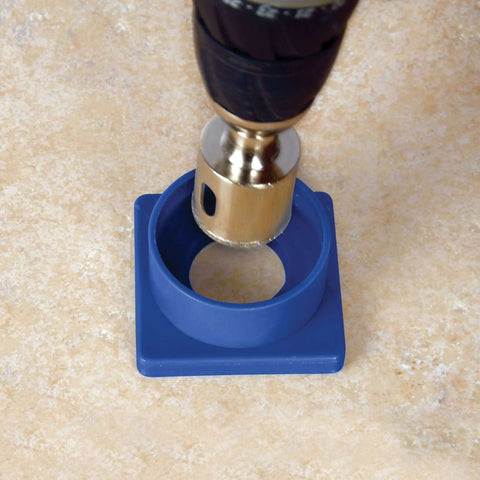 Top-down view of 1-3/8 in Xtreme Diamond Hole Saw with water delivery system in a blue plastic guide base
