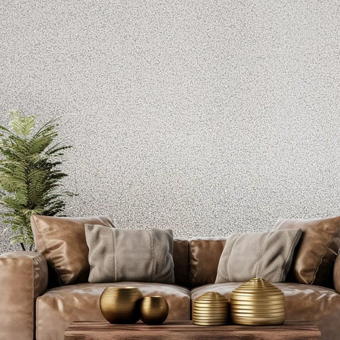 Premium Pink Off White And Cream Textured Wallpaper Rolls With Killer Mica Stone Chip Look applied in a cozy living room setting.
