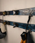 Slick Horizontal Ski Rack Wall Mount Bracket Black Hookless Design Keeps Your Boards Flat Against The Wall with jackets and gear.