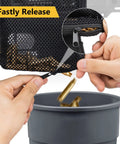Heat Resistant Brass Shell Catcher With Thick Nylon Shell Zipper Bottom Brass Collector Two Picatinny Rail Mounts Easy On Off AR Style Range Accessory Durable Range Gear In Black And Green Finish mesh bag emptying brass casings into a bin
