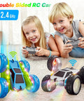 Children playing with Epic 360 Degree Flip RC Car All Terrain 4WD Stunt Toy featuring LED lights and remote controllers