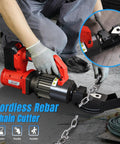 Loschen Cordless Rebar Chain Cutter Portable Electric Hydraulic Tool For Cutting Metal Chains Locks And Steel Cables Up To 10mm with a worker using it on-site.