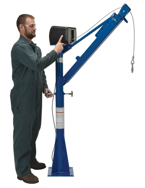 Operator using Powered Cable Winch on Built Tough AC Power Jib Crane With 1500 Lb Capacity And 66 Inch Telescoping Boom.